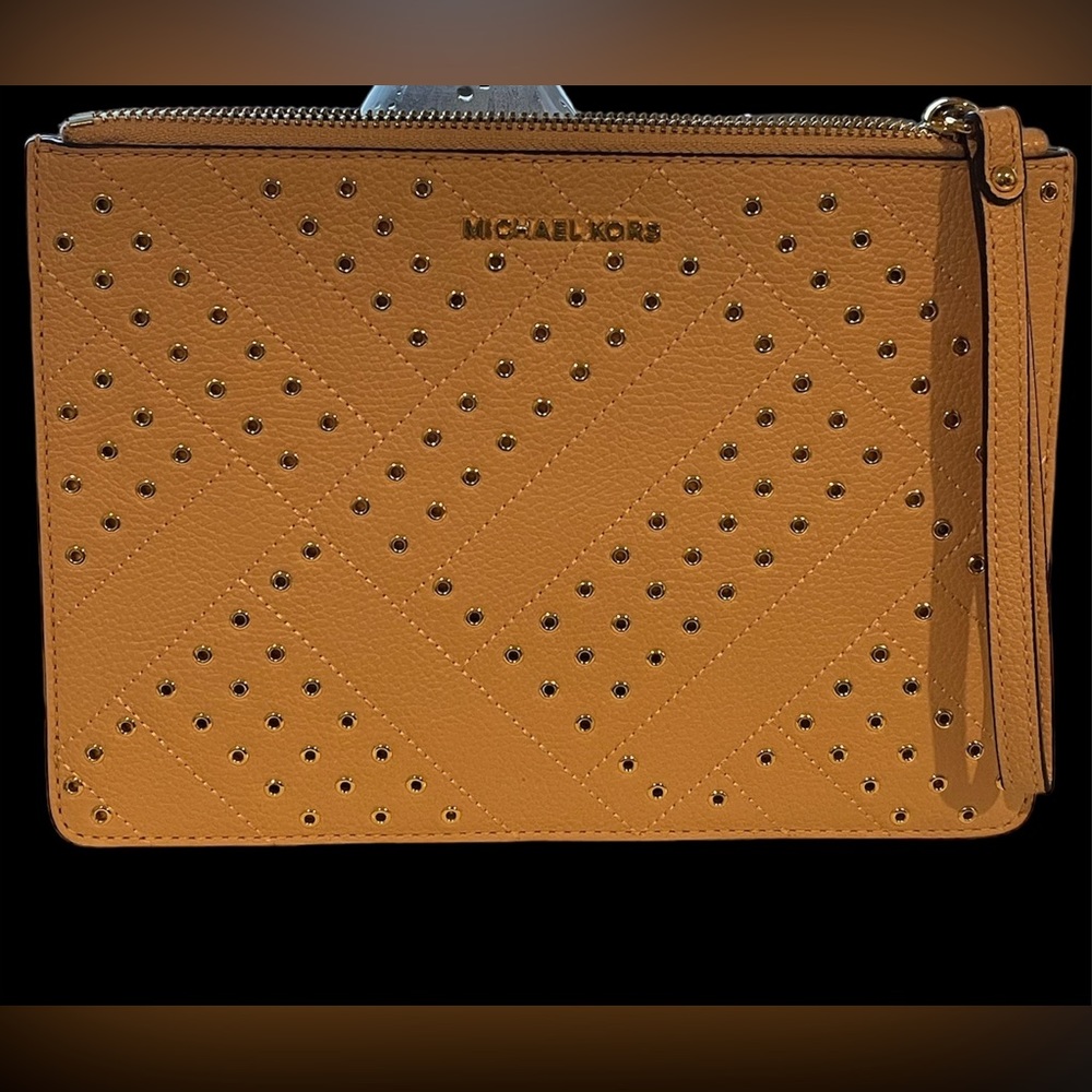 Michael Kohrs wristlet.  Excellent condition.